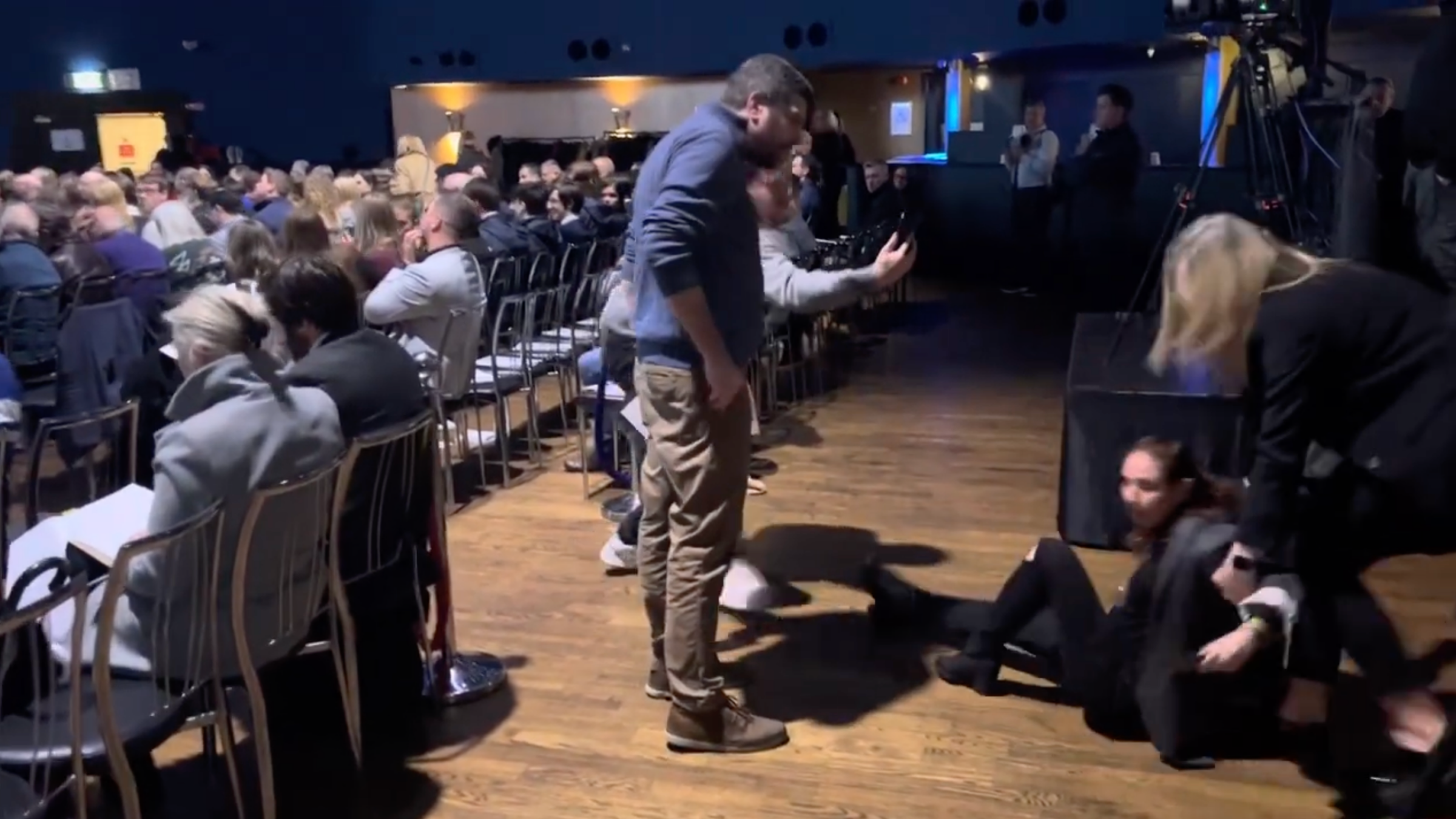 Lior Tibet, an Israel-Irish researcher, is dragged out of a Holocaust memorial ceremony after protesting comments by Irish President Michael Higgins in Dublin, Jan. 26, 2025. (Screenshot)